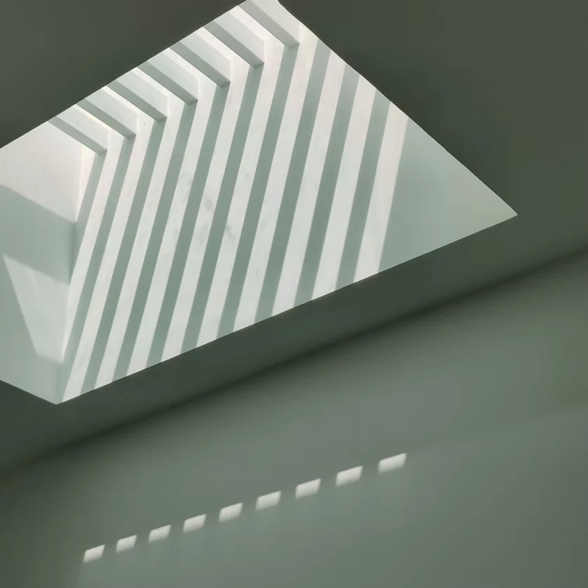 Illustrative sunlight passing through a skylight