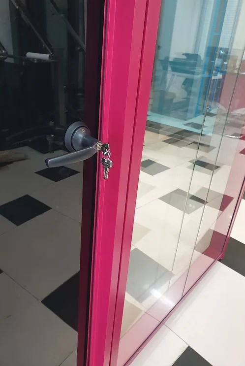 Colored aluminum-framed glass door detail